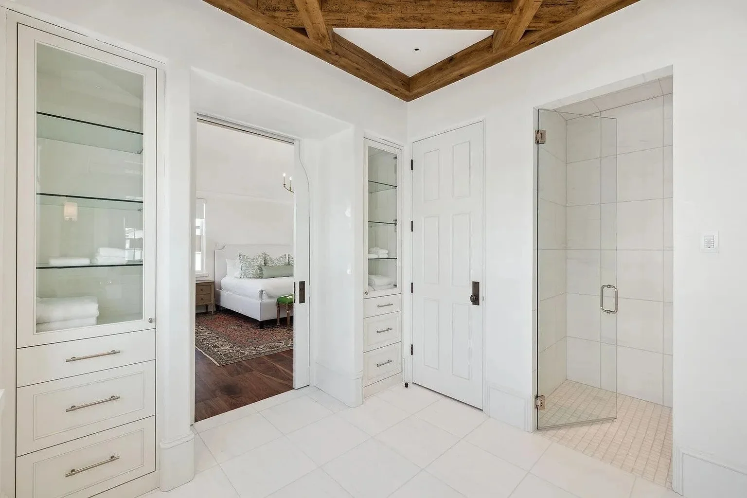 050-guest-bath-wood-beams-glass-closet.jpg