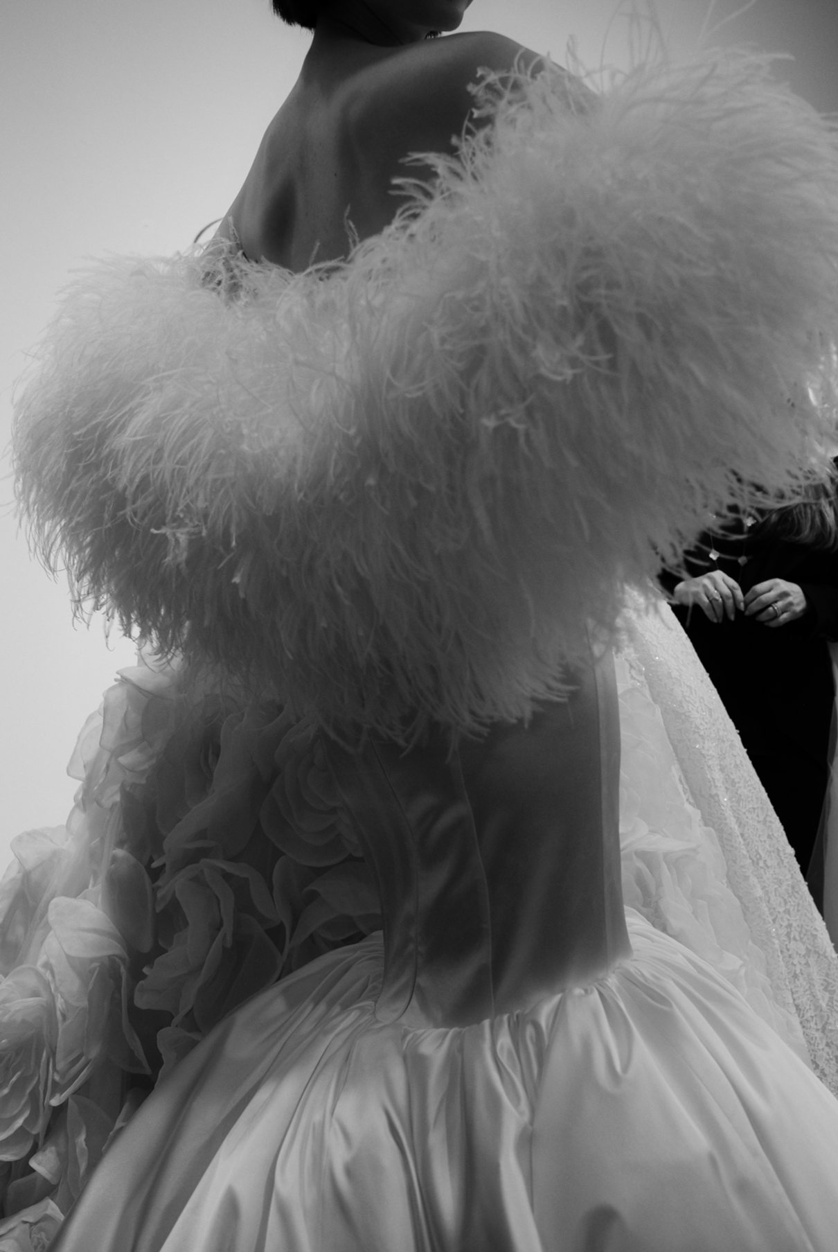 Bride in feather and fur stole, editorial luxury wedding photography by PURR Studio
