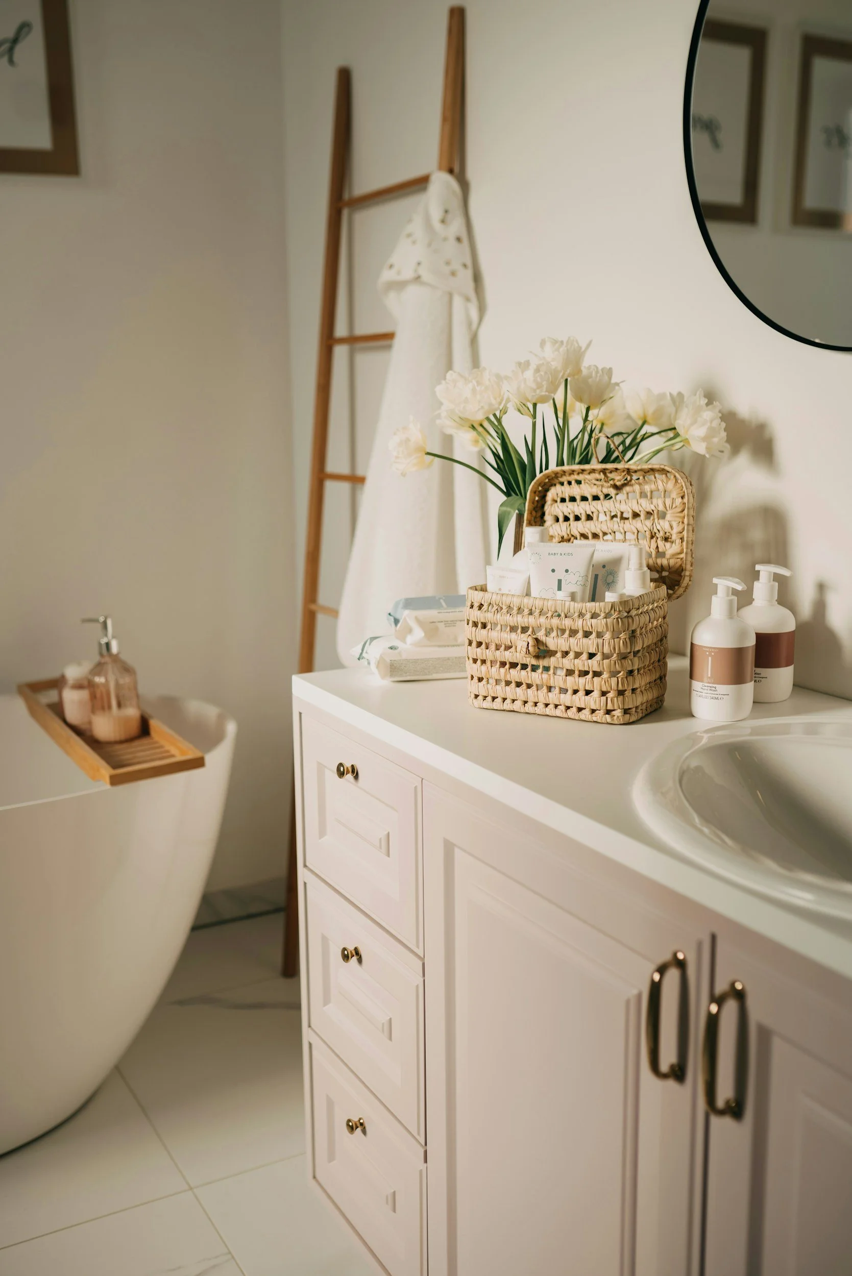 A professionally organized bathroom featuring simple storage solutions that make daily routines easier while reducing clutter and creating a spa-like atmosphere.