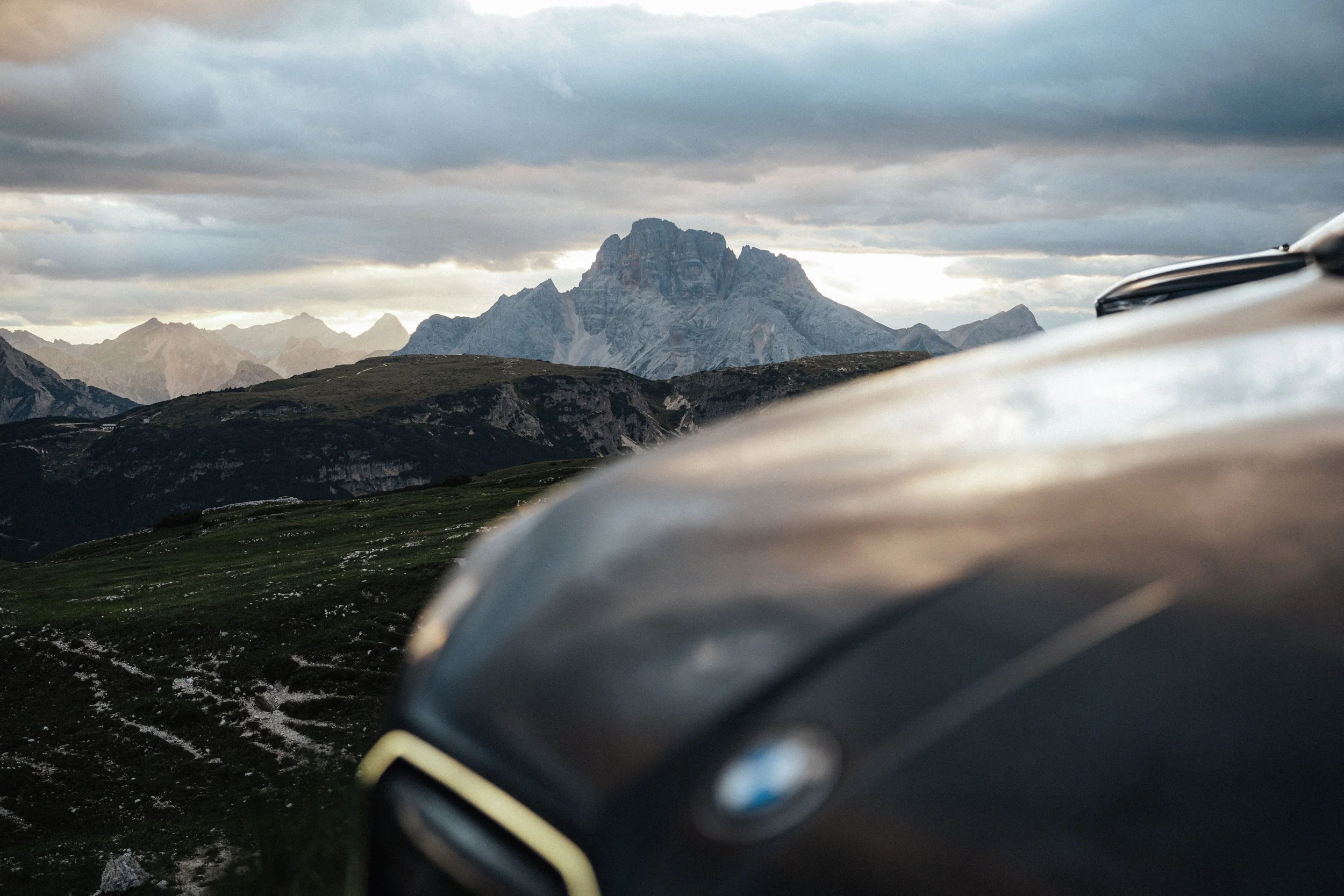 Mountain landscape with a blurred car in the foreground