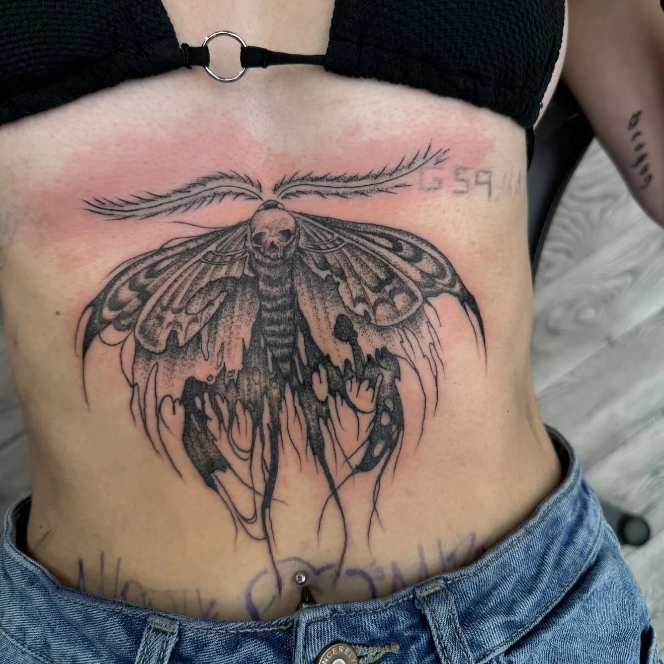 gnarley custom death moth tummy rocker for @madd.yb44 💀 #deathmothtattoo #stomachtattoo #blackandgrey 

#marioelijahtattoos #threetearstattoo #explorepage  #artistowned #localbusiness #supportlocal #coloradotattoo #foco  #fortcollins #csu #csurams #