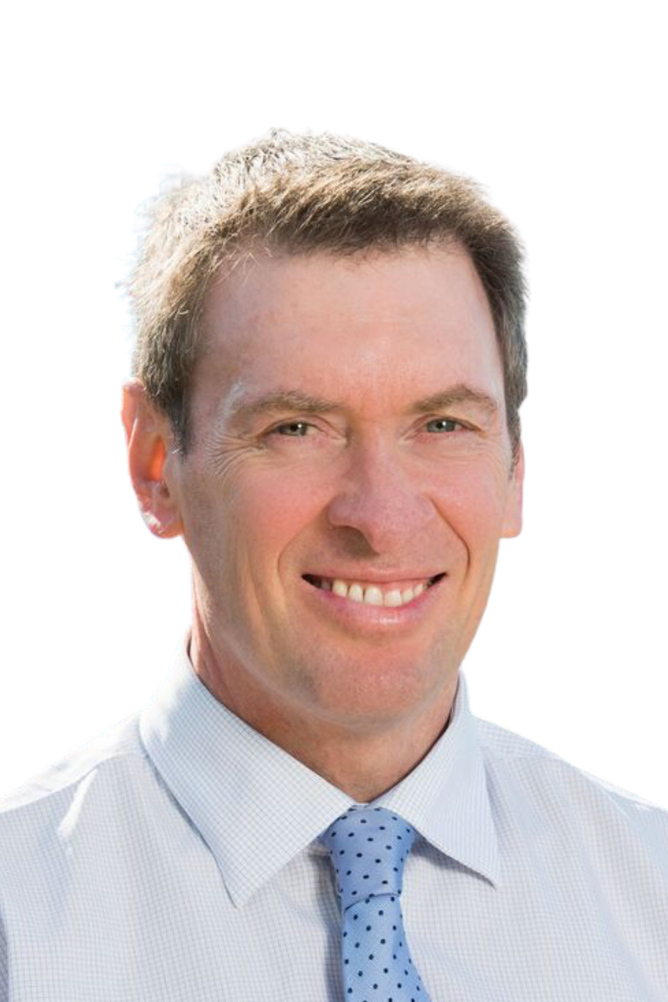 Smiling man in a dress shirt and tie