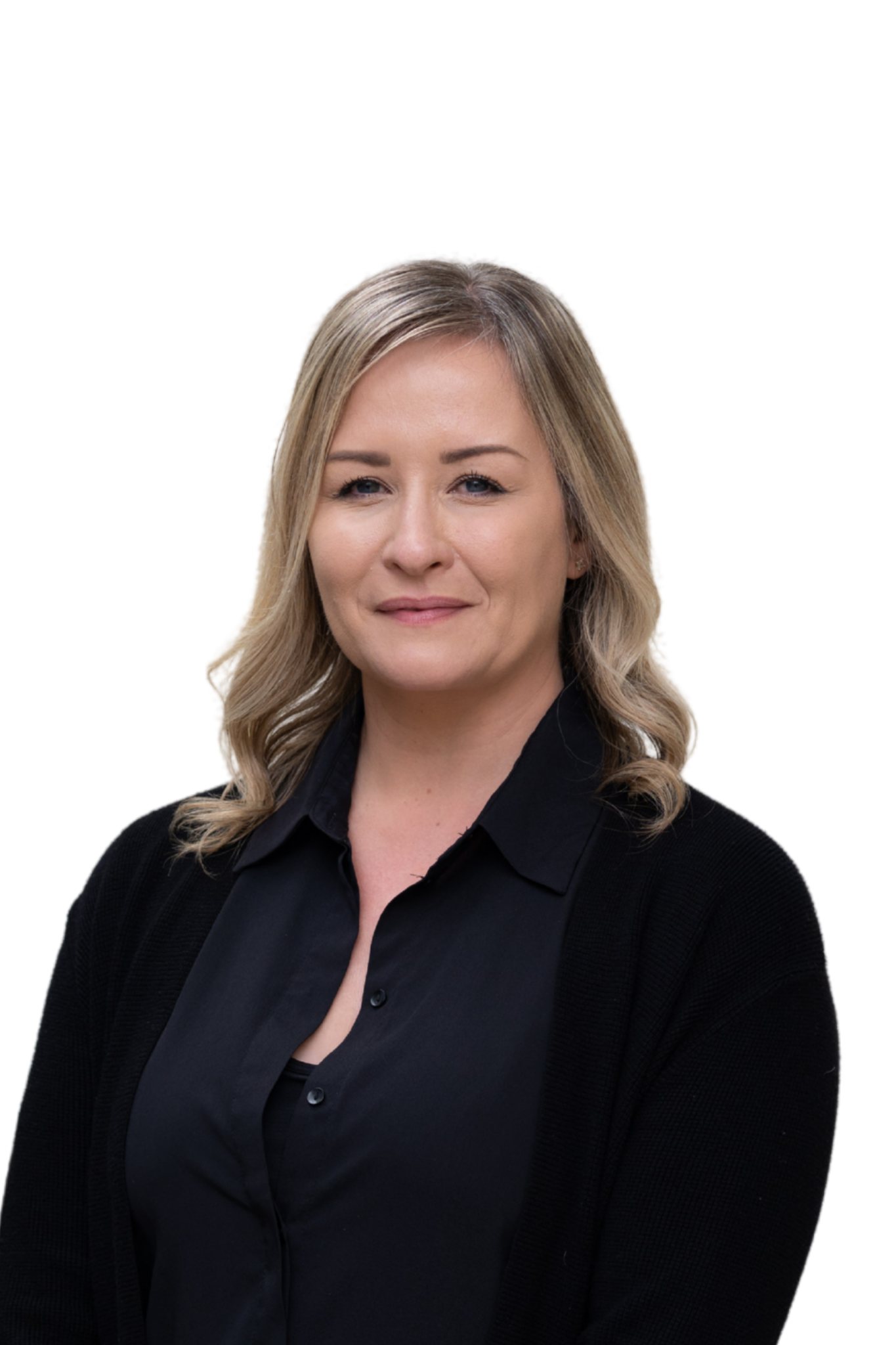 A woman with blonde hair and a slight smile, wearing a black shirt and black cardigan.