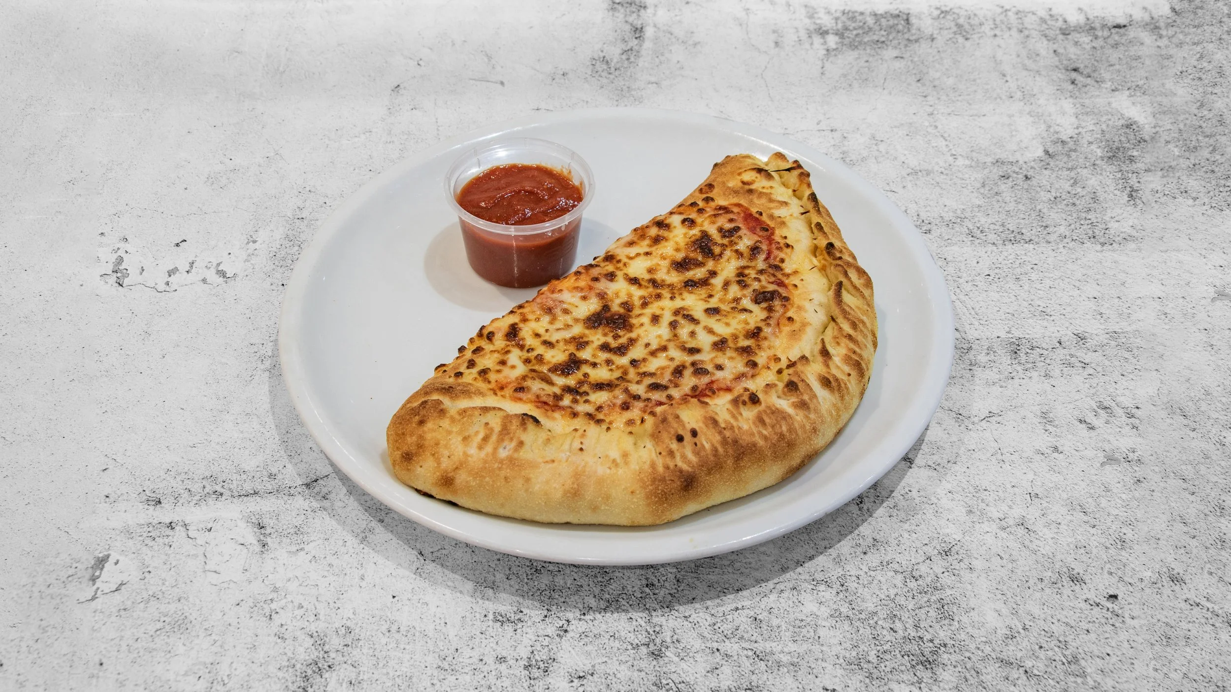 MeltonPizza_ChilliPaneerCalzone.jpg