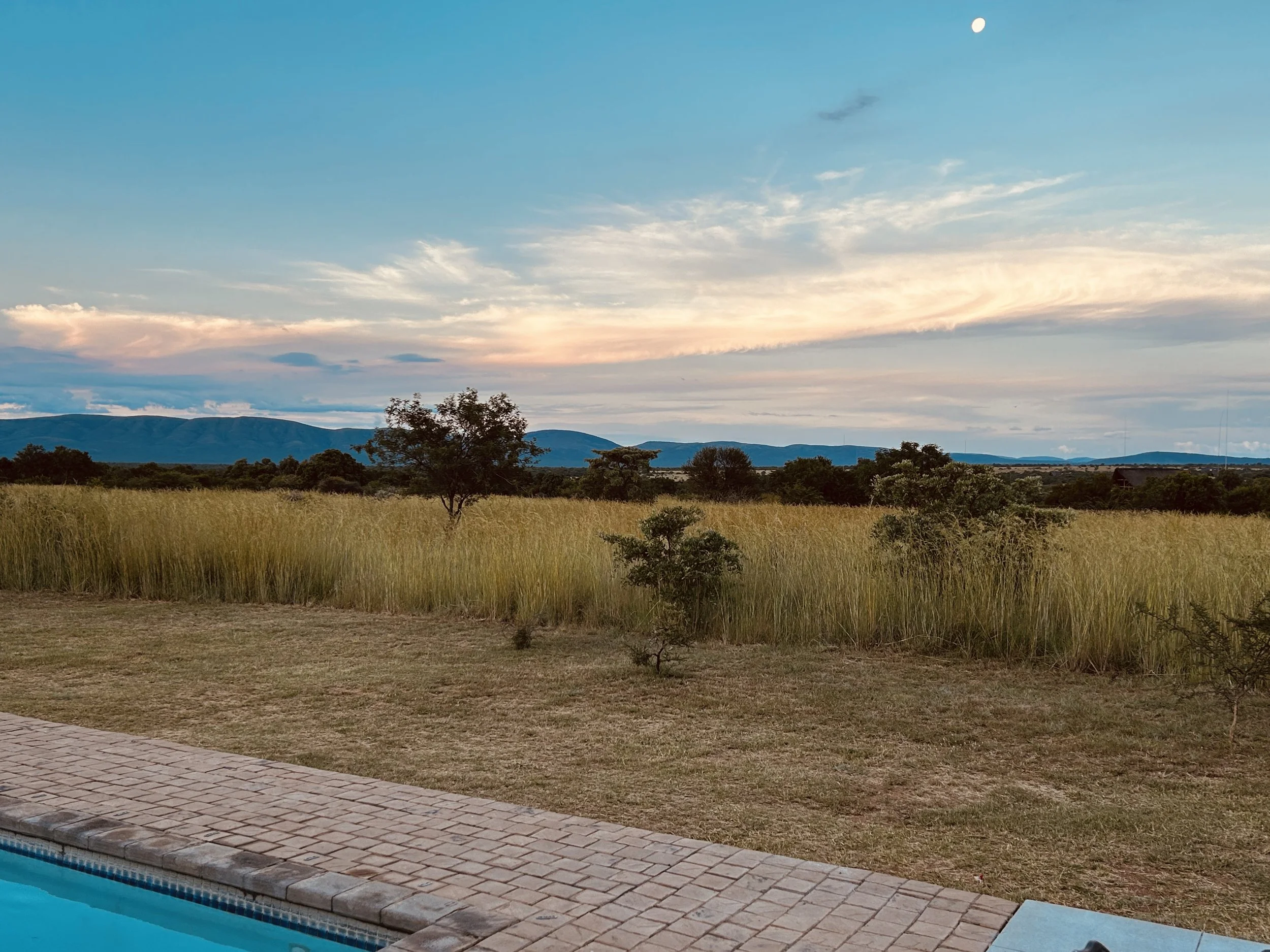 Sunset over the South African savanna at Zebula Golf Estate & Spa.