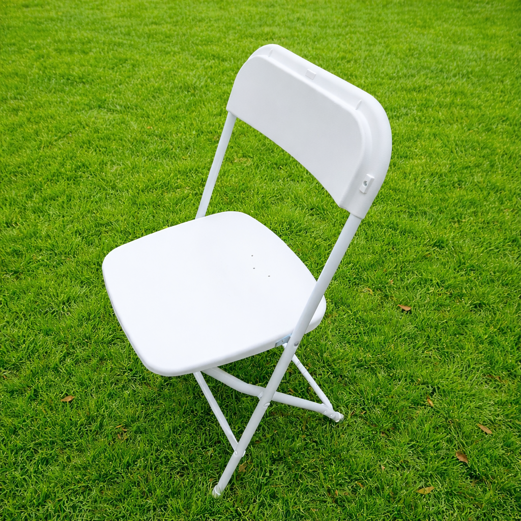 white chair grass background.png