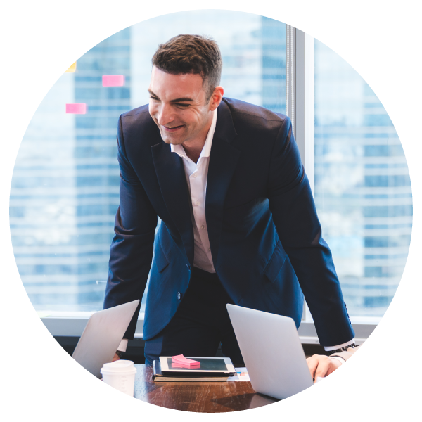 Male senior project manager leading a team meeting