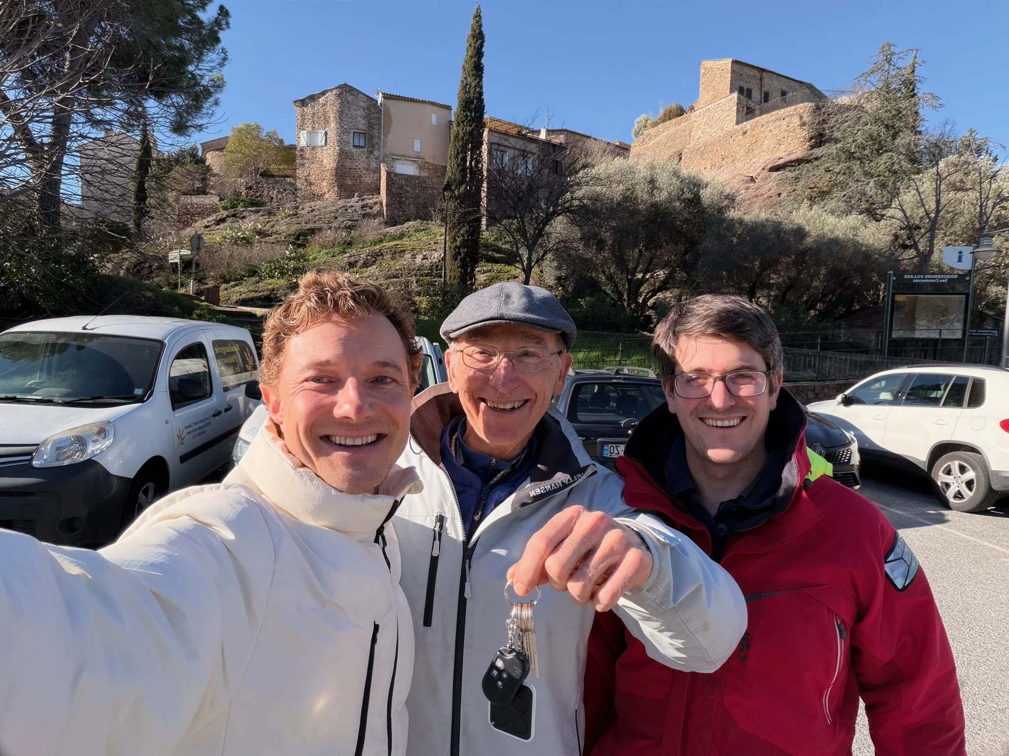 Happy clients collecting the keys to their new home in France