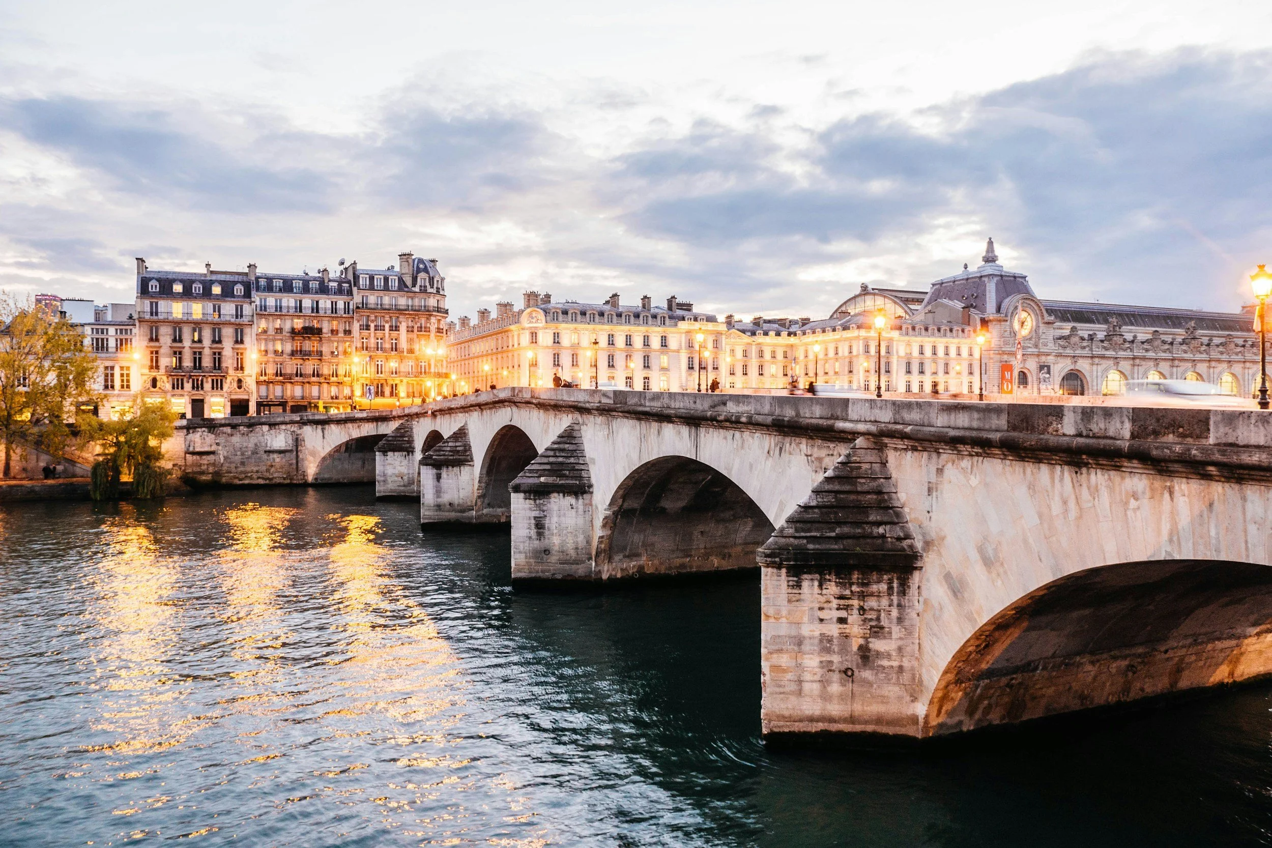 Bridge over the river seine at dusk