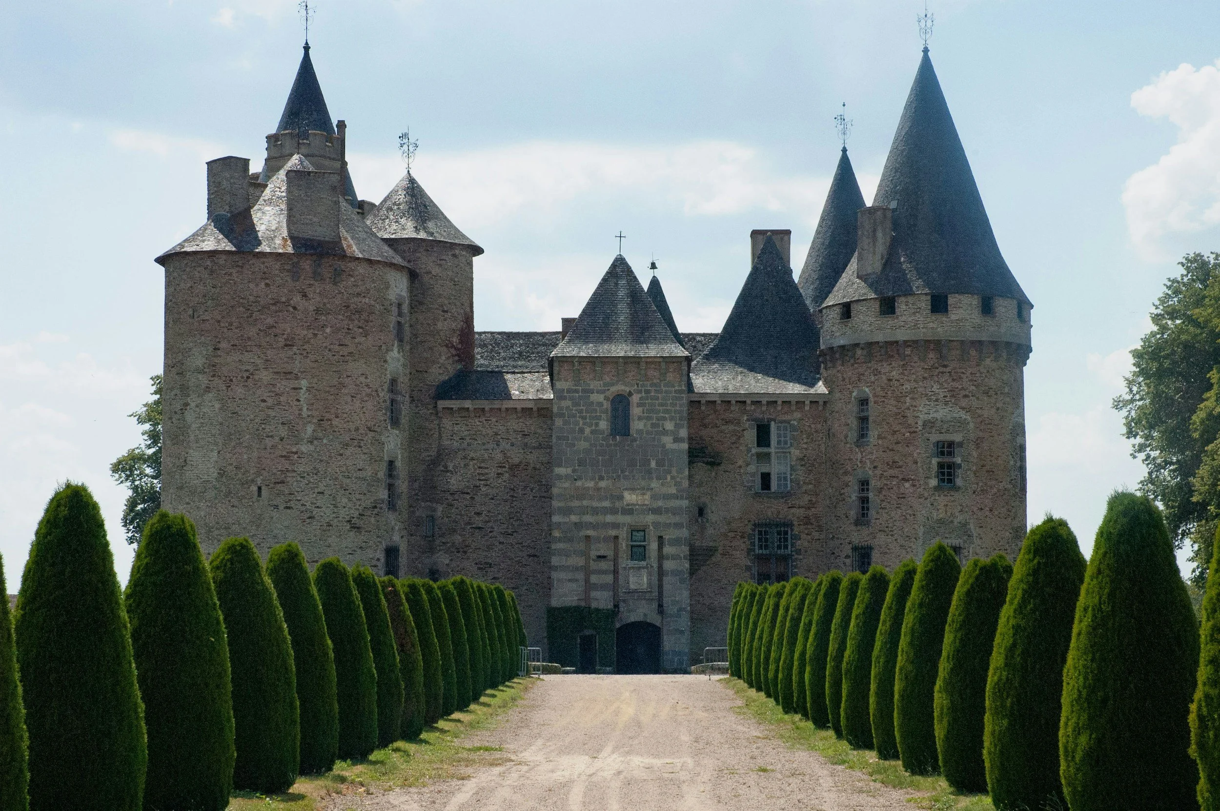 Stunning medieval château with towers, set within ga