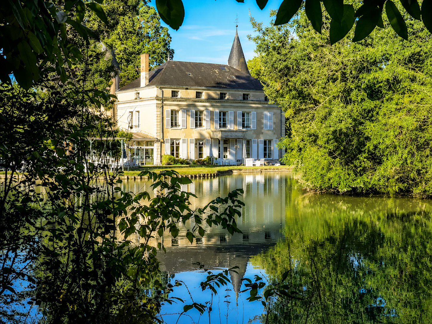 View of the château with the lake