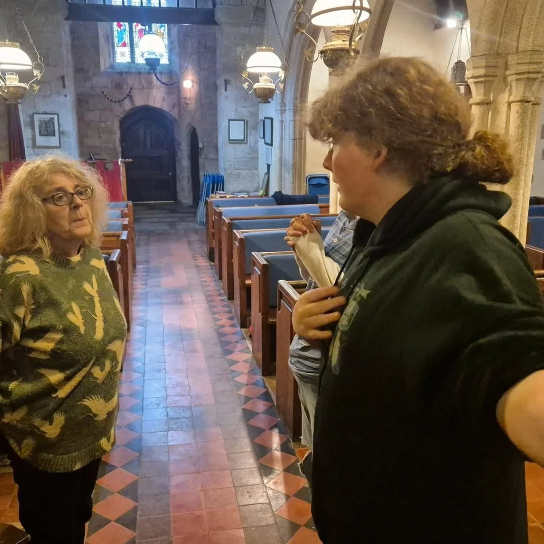 Crew-member prepares interviewee on what to expect