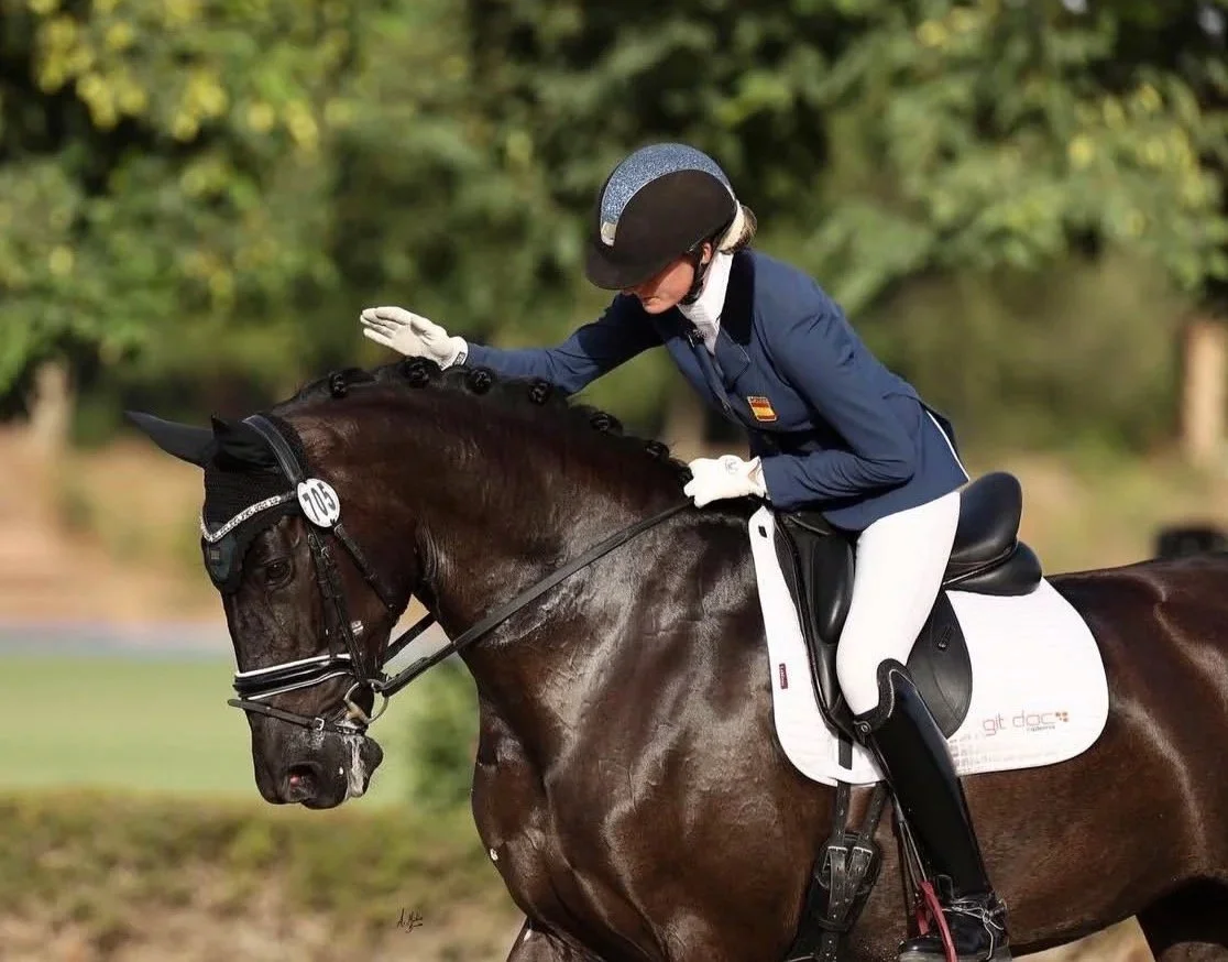 María Gómez Guzmán is a Spanish dressage rider competing in national and international competitions.