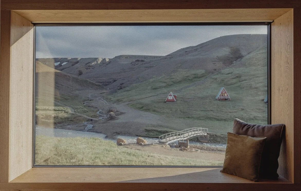 Interior of one of the rooms at Highland Base, with views of the Icelandic Highlands