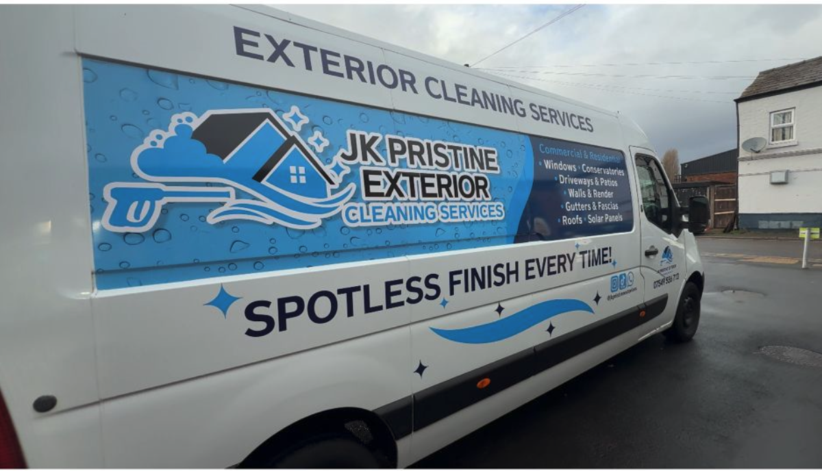 White van with advertising for JK Pristine Exterior Cleaning Services, featuring a house with bubbles, and text promoting exterior cleaning services like windows, driveways, walls, gutters, roofs, and solar panels.