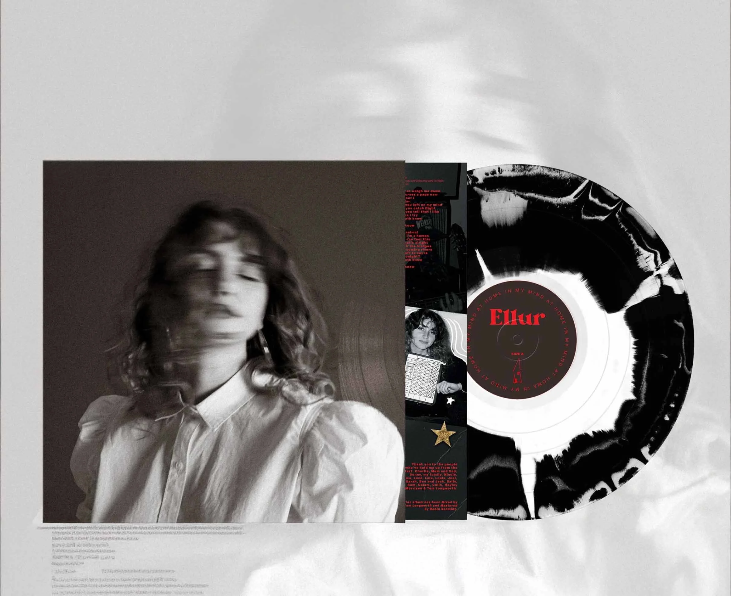 Ellur debut album sleeve with vinyl record sliding out