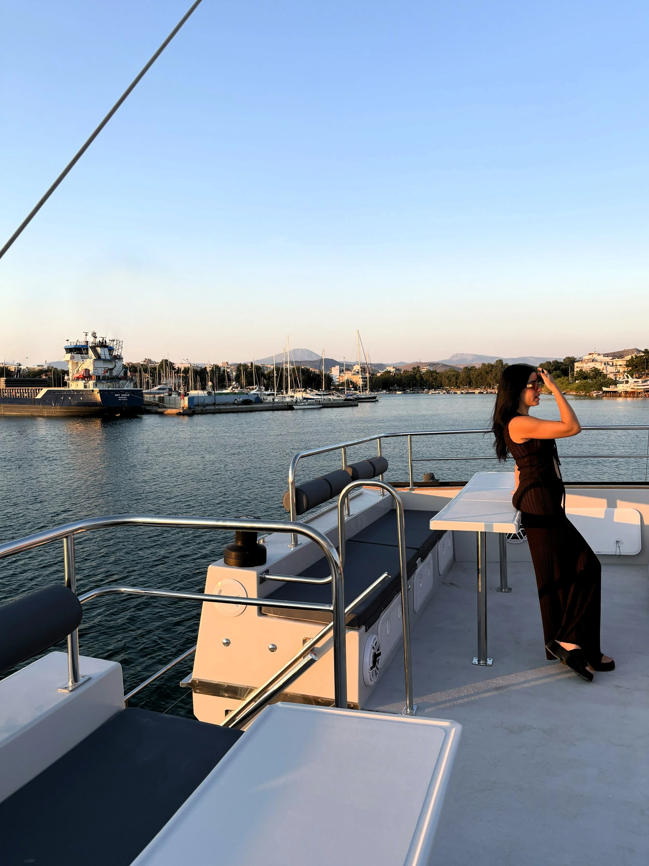 A woman on a catamaran.