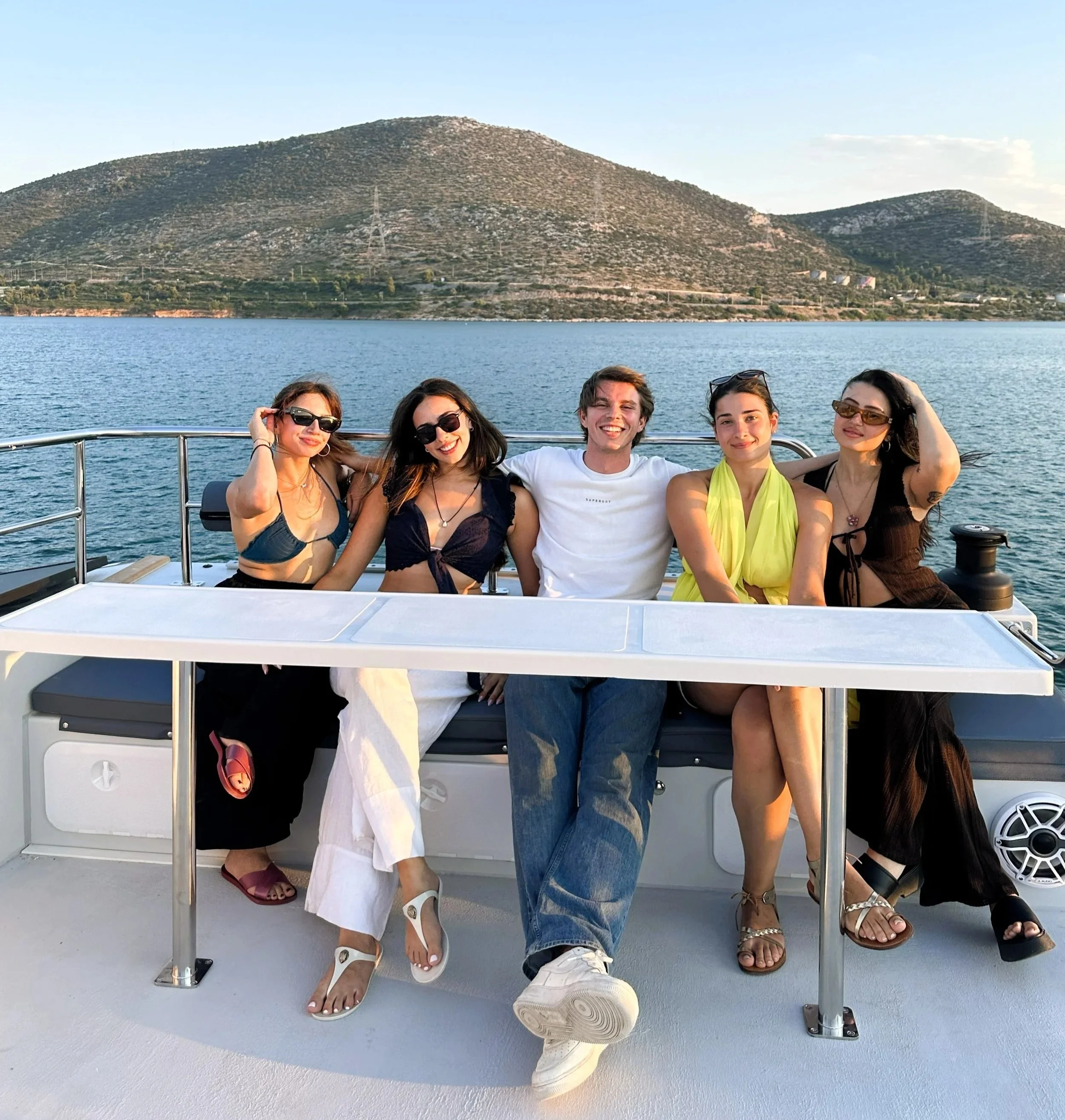 A group of friends on a catamaran.