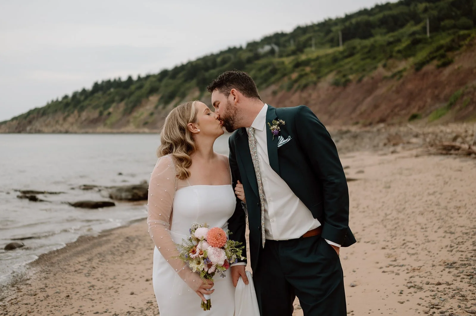 Laurie’s customers, Larissa and Emmett, just married walking off the aisle together.