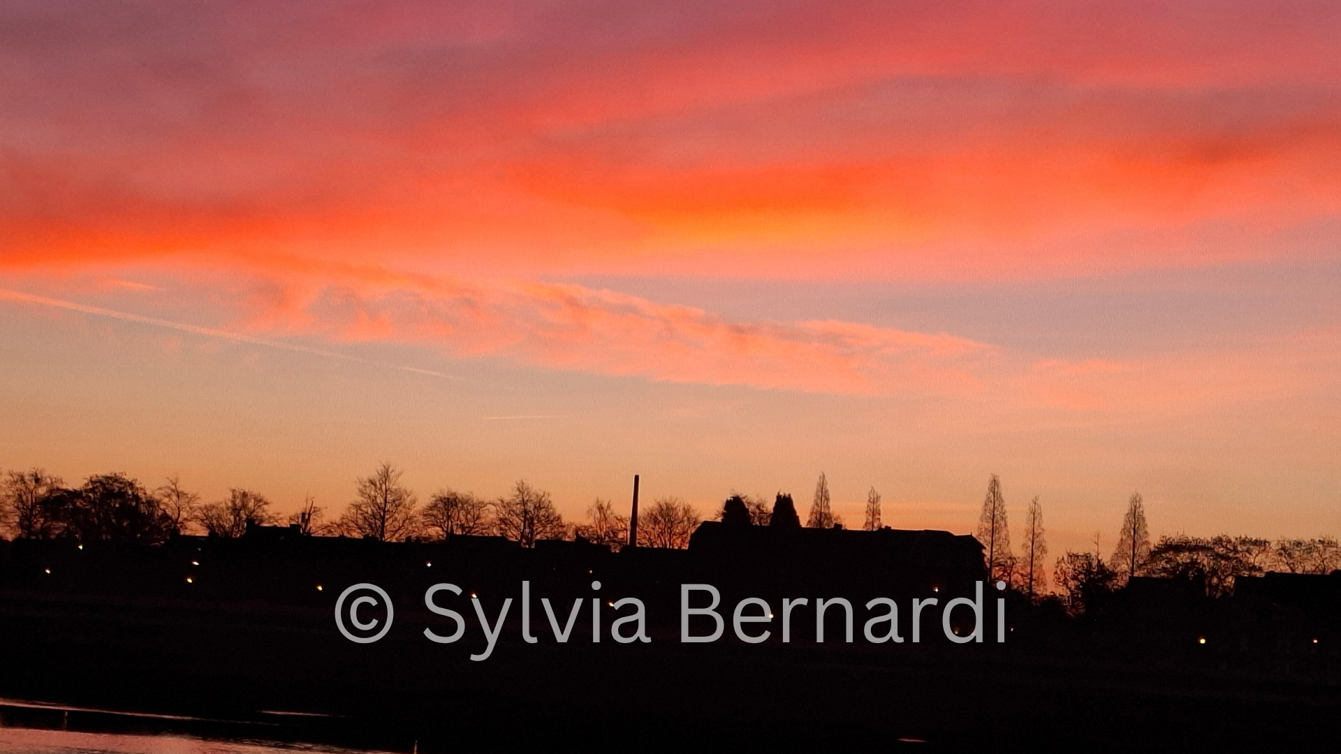 Rose Sky over the River Dramatic Sunset