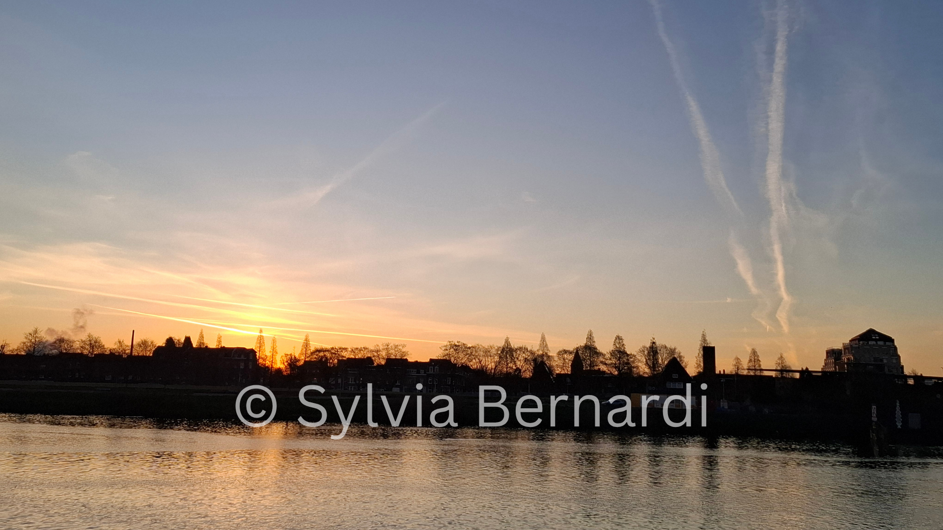 Contrails at Sunset Golden Sky