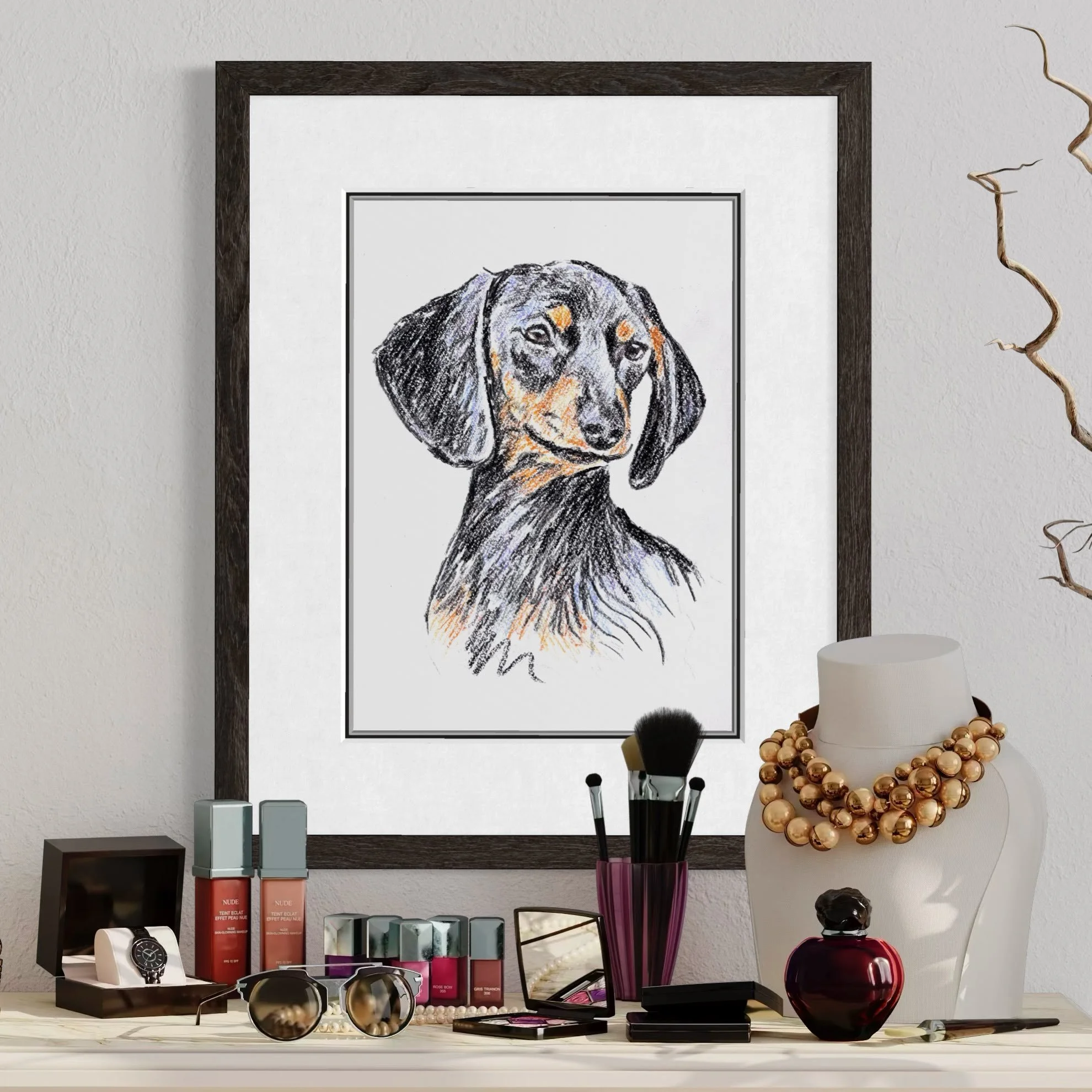 Framed hand-drawn pet portrait displayed on a dresser as meaningful home décor by Jonny Atkinson