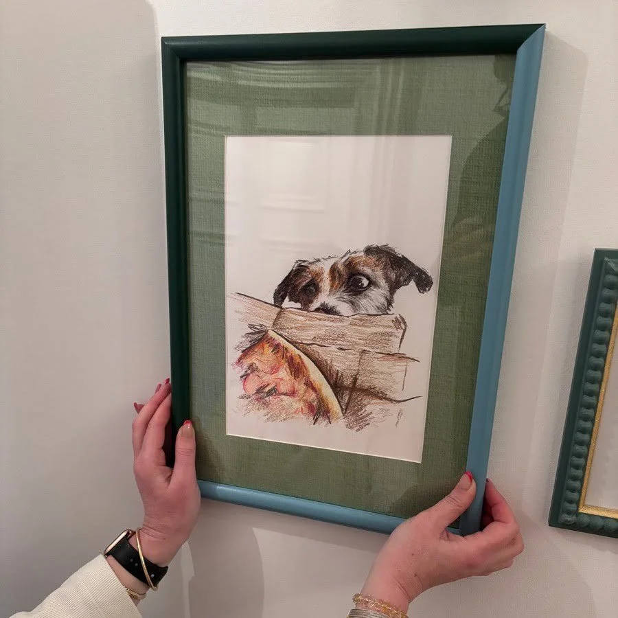 Client photo of pet portrait commission in home