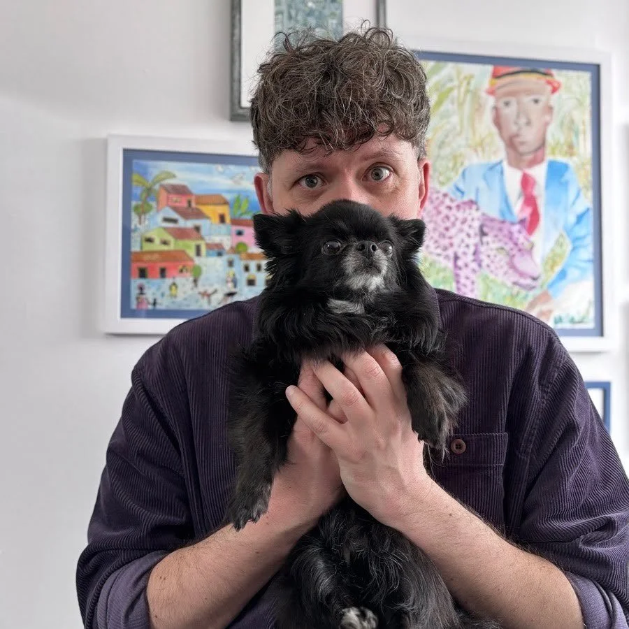 Pet portrait artist Jonny Atkinson and his chihuahua dog Badger