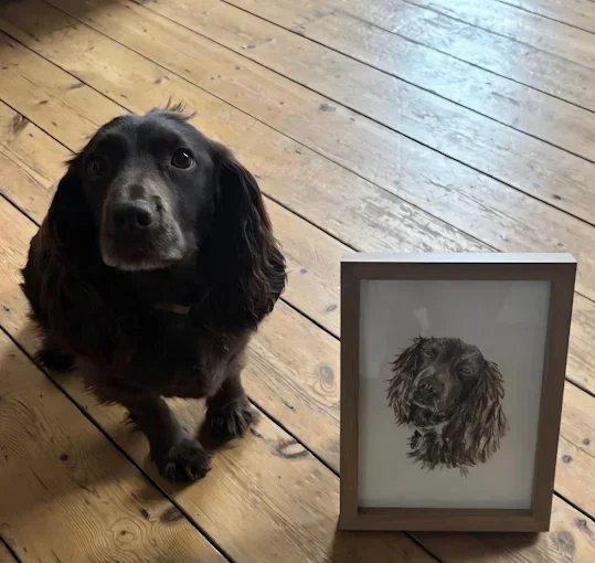 Star next to her custom pet portrait