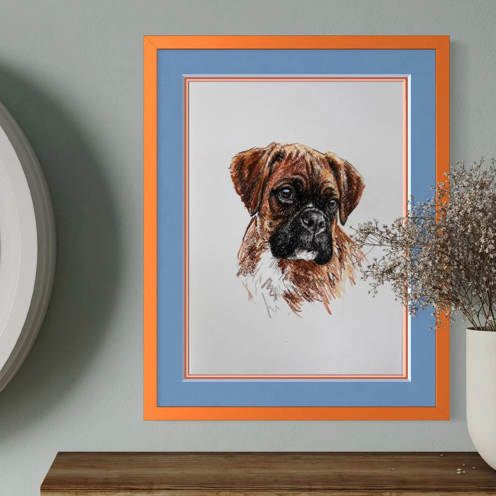Framed boxer dog drawing on wall in modern home close up