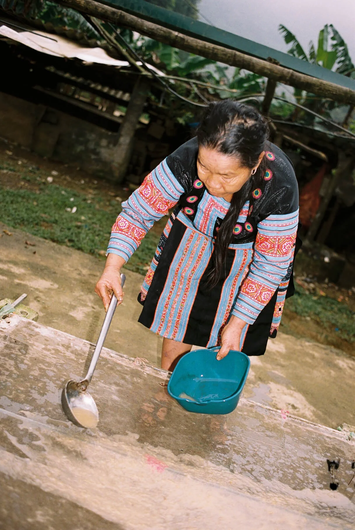 bamboo pulp is spread evenly across a fine mesh screen, where the bamboo paper sheets begins to take shape