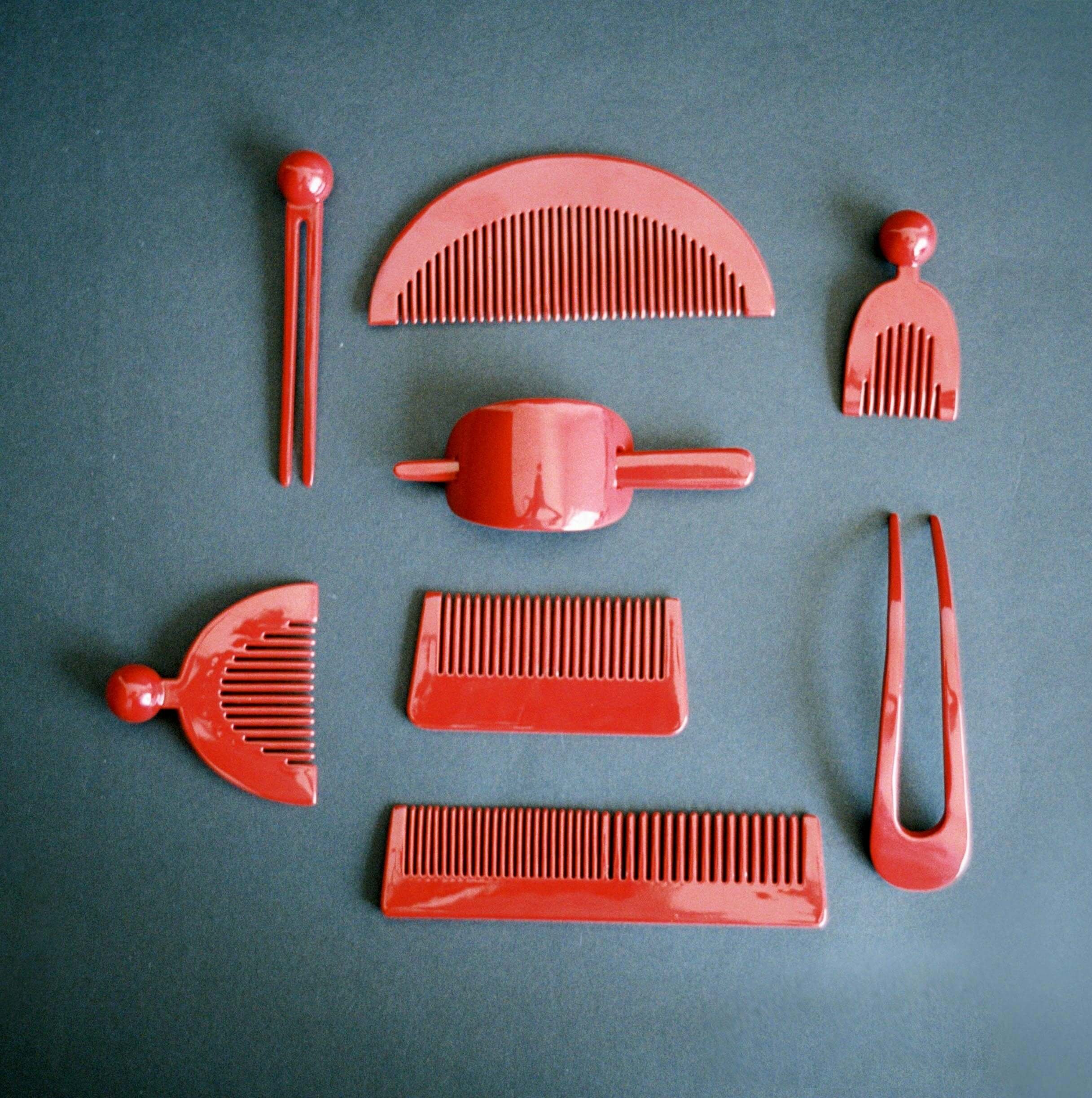Buffalo horn combs and hairpins hand carved and lacquered in oxblood