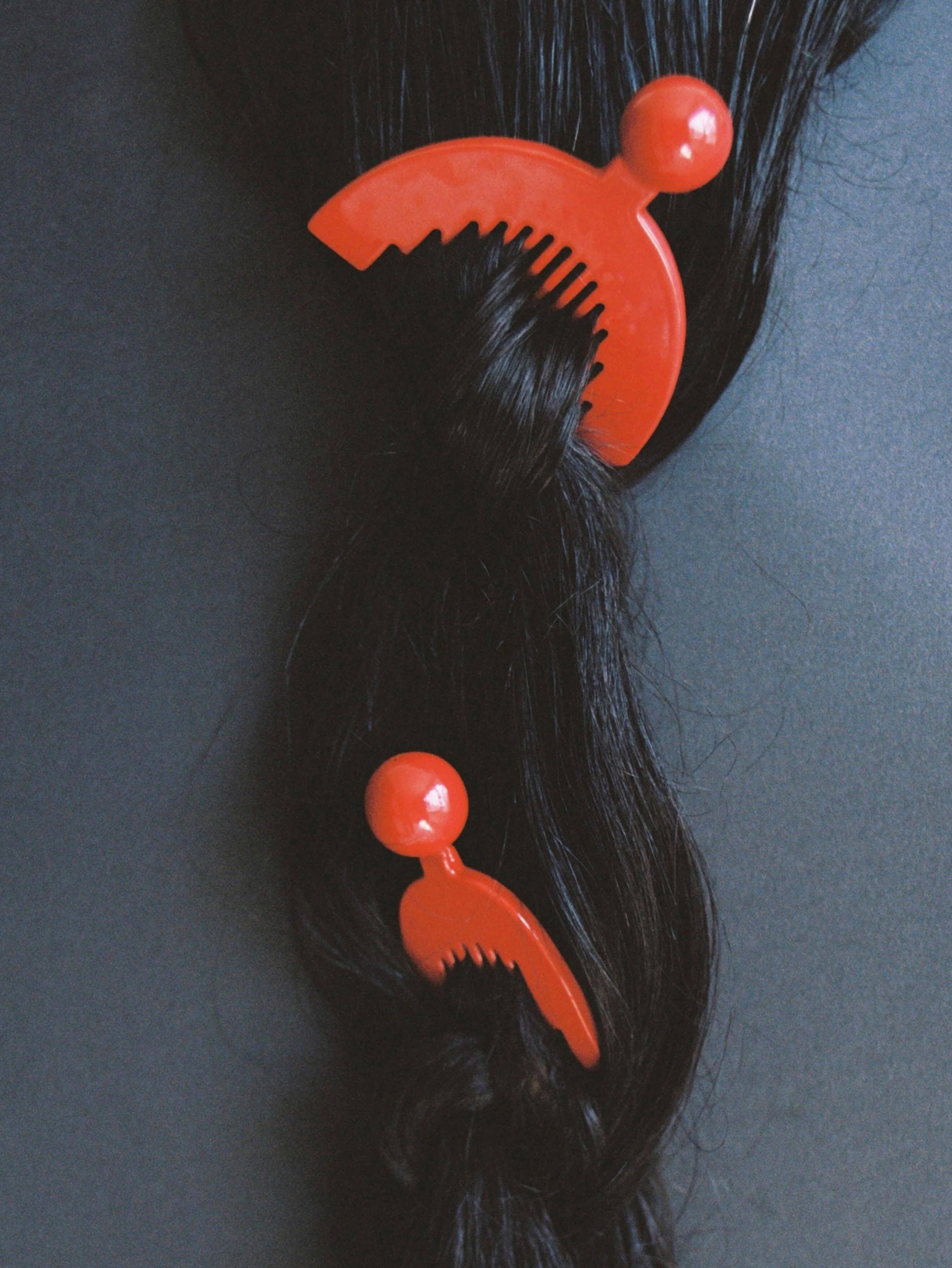 Buffalo horn combs polished in oxblood lacquer