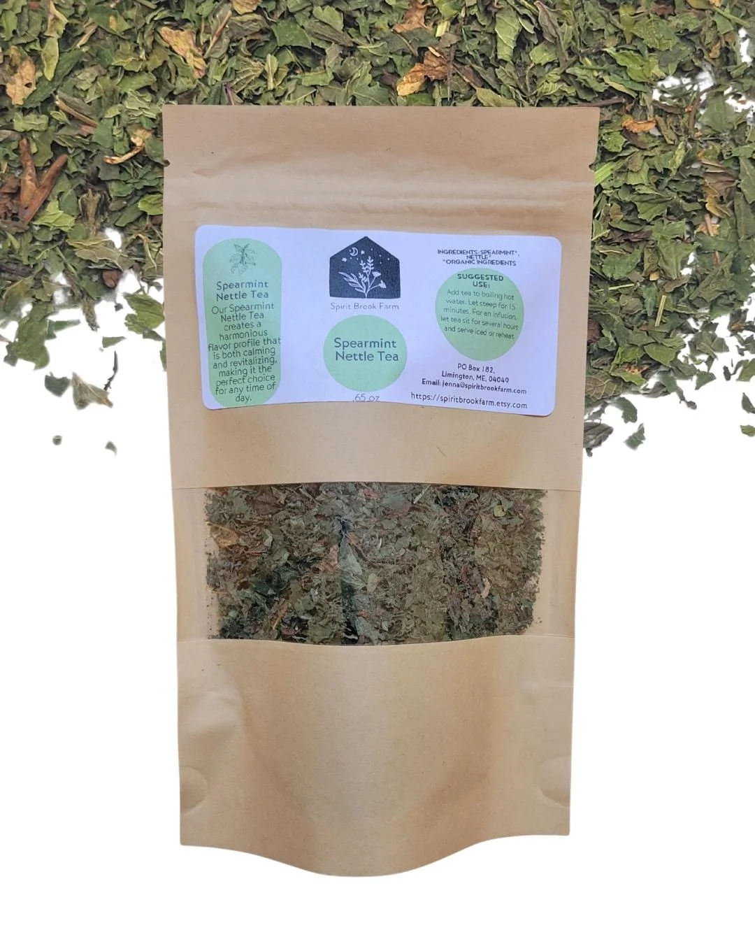 spearmint nettle tea in front of herbal background