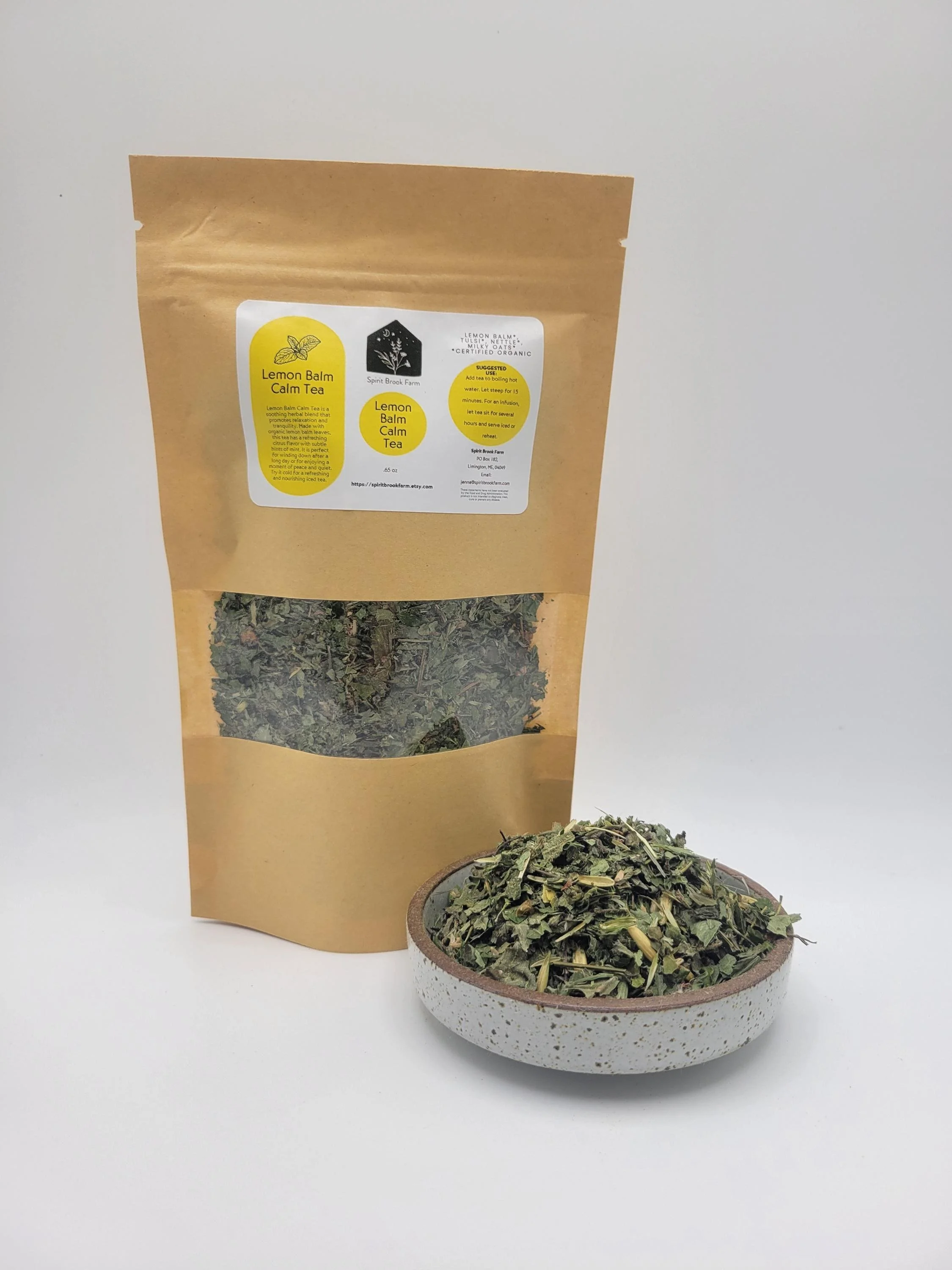 lemon balm calm loose leaf tea with small bowl of loose leaf tea