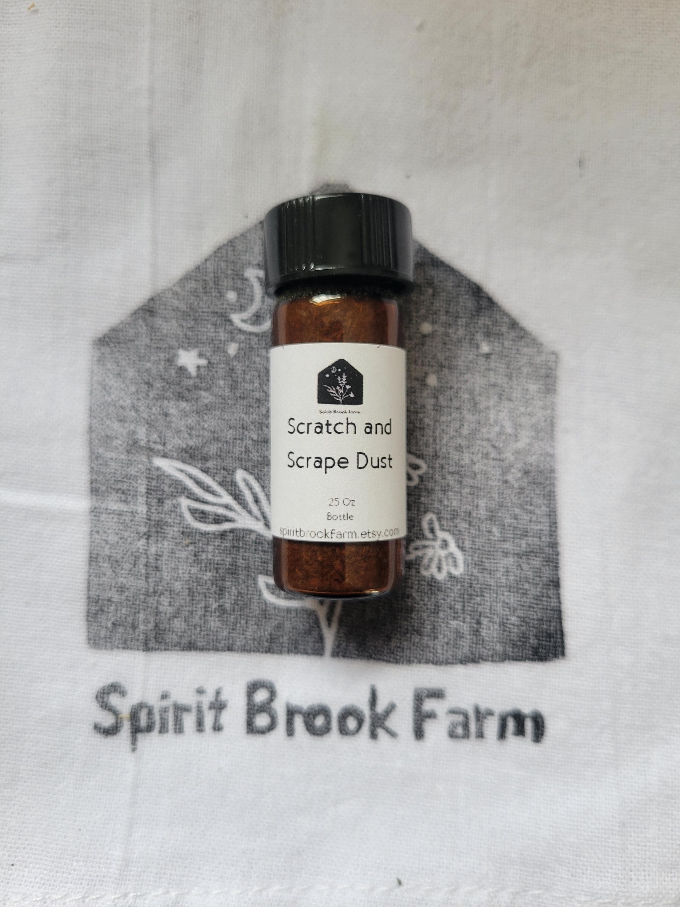 scratch and scrape dust .25 oz bottle on cloth