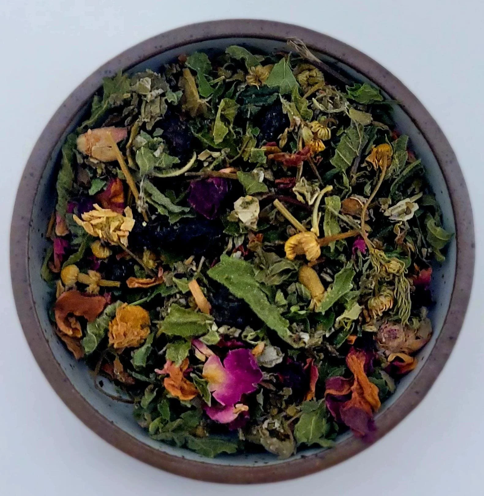 Loose leaf blueberry moon tea in small bowl display