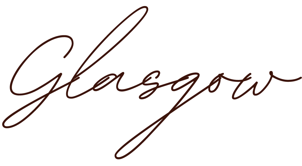 Stylish cursive text spelling 'Gleasgow' in dark brown color on a transparent background.