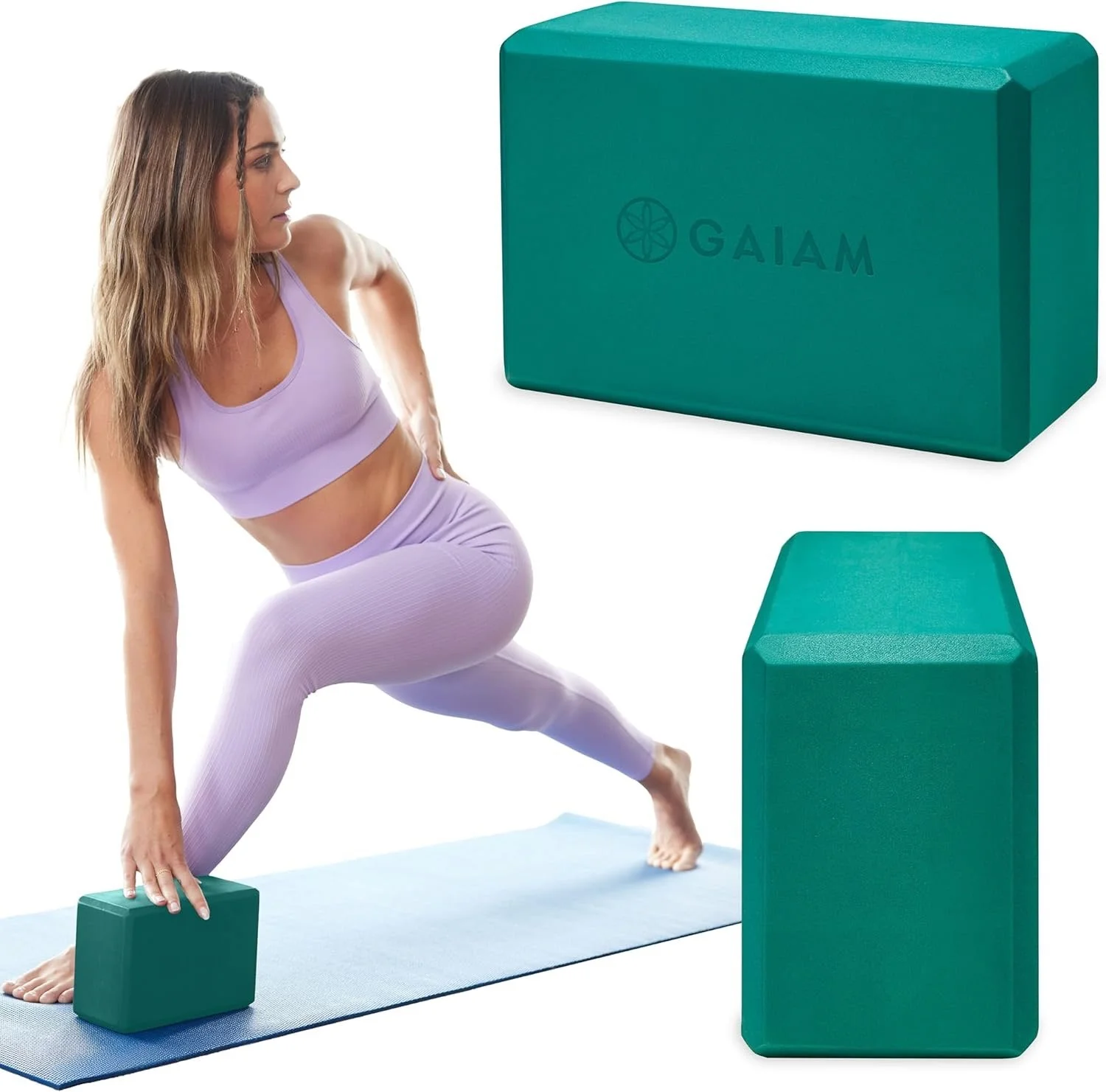 A woman practicing yoga on a blue mat with yoga blocks, including a woman in lavender activewear in a lunge position, holding a green yoga block with one hand, and two additional green blocks in the background.