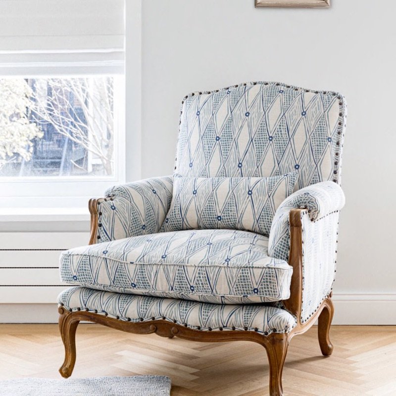 Blue and White Vintage Chair in a Living Room