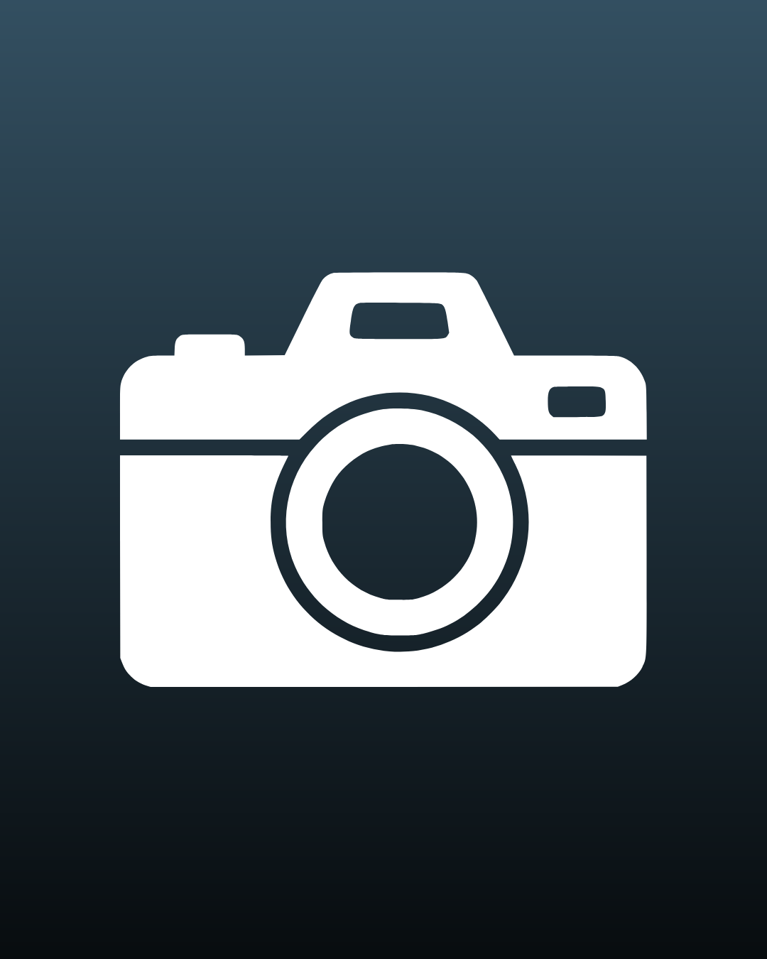 Icon of a vintage camera with a large circular lens and a viewfinder on top.