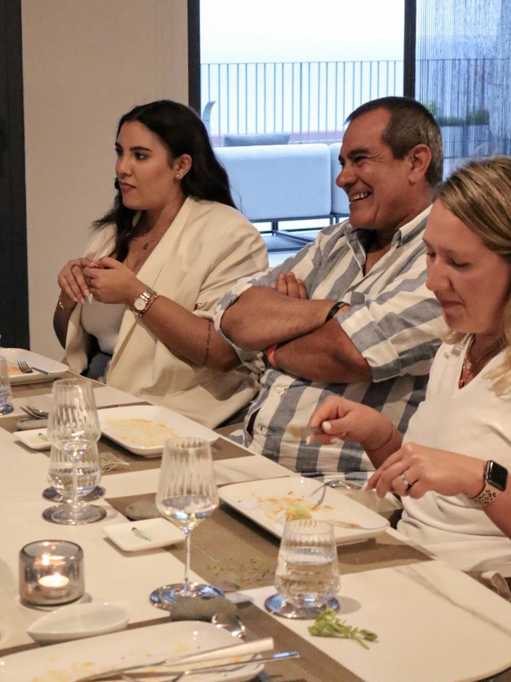 Guests enjoying meaningful conversation over a multi-course private dining experience at Food with a View in Madeira.