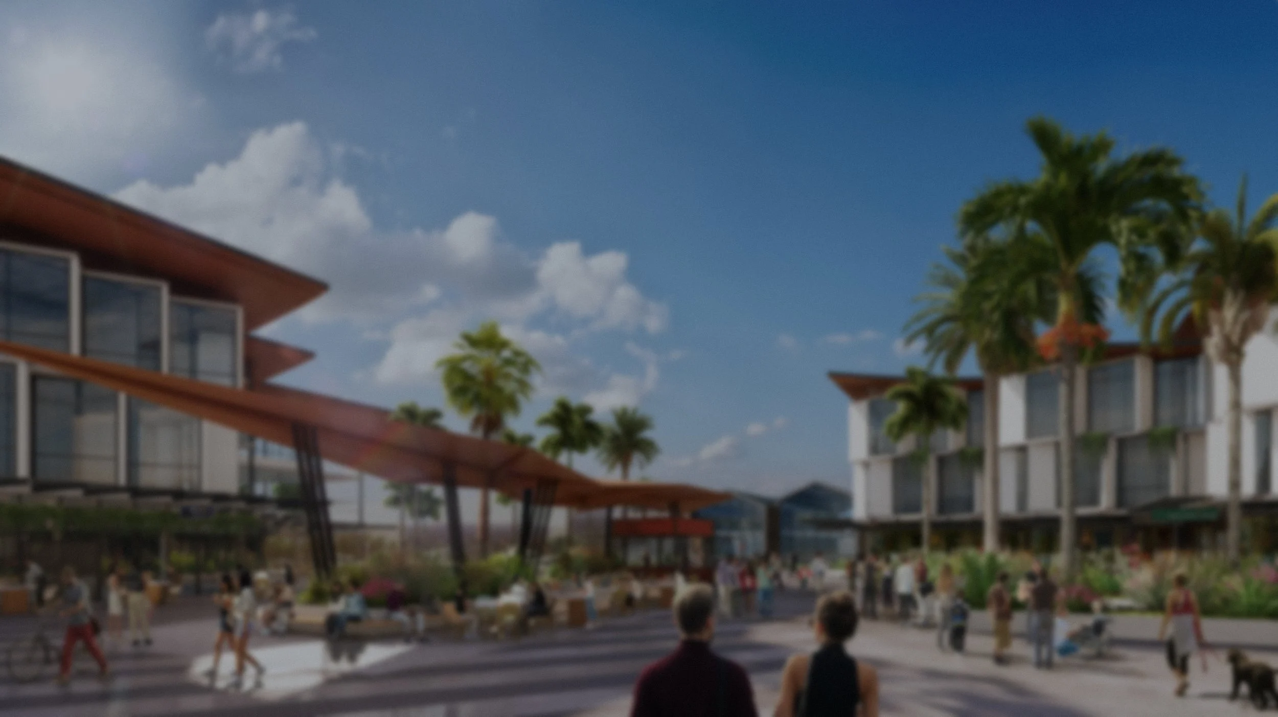 An outdoor scene with modern buildings, palm trees, and people walking and sitting in a public space on a sunny day.