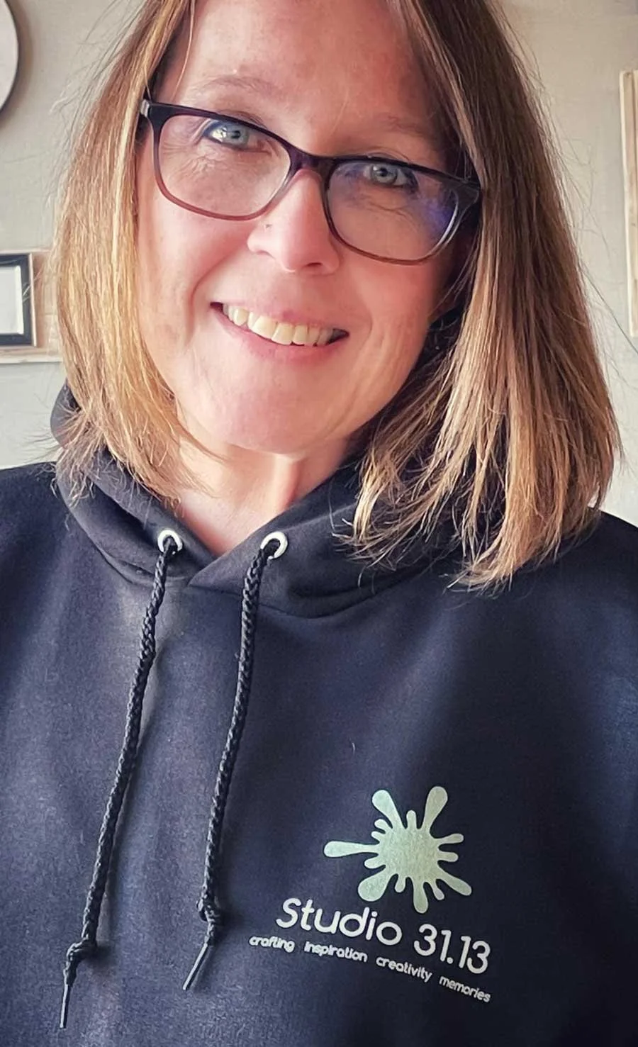 Christine Caldwell, founder of Spark for Small Businesses, smiling in a casual portrait.