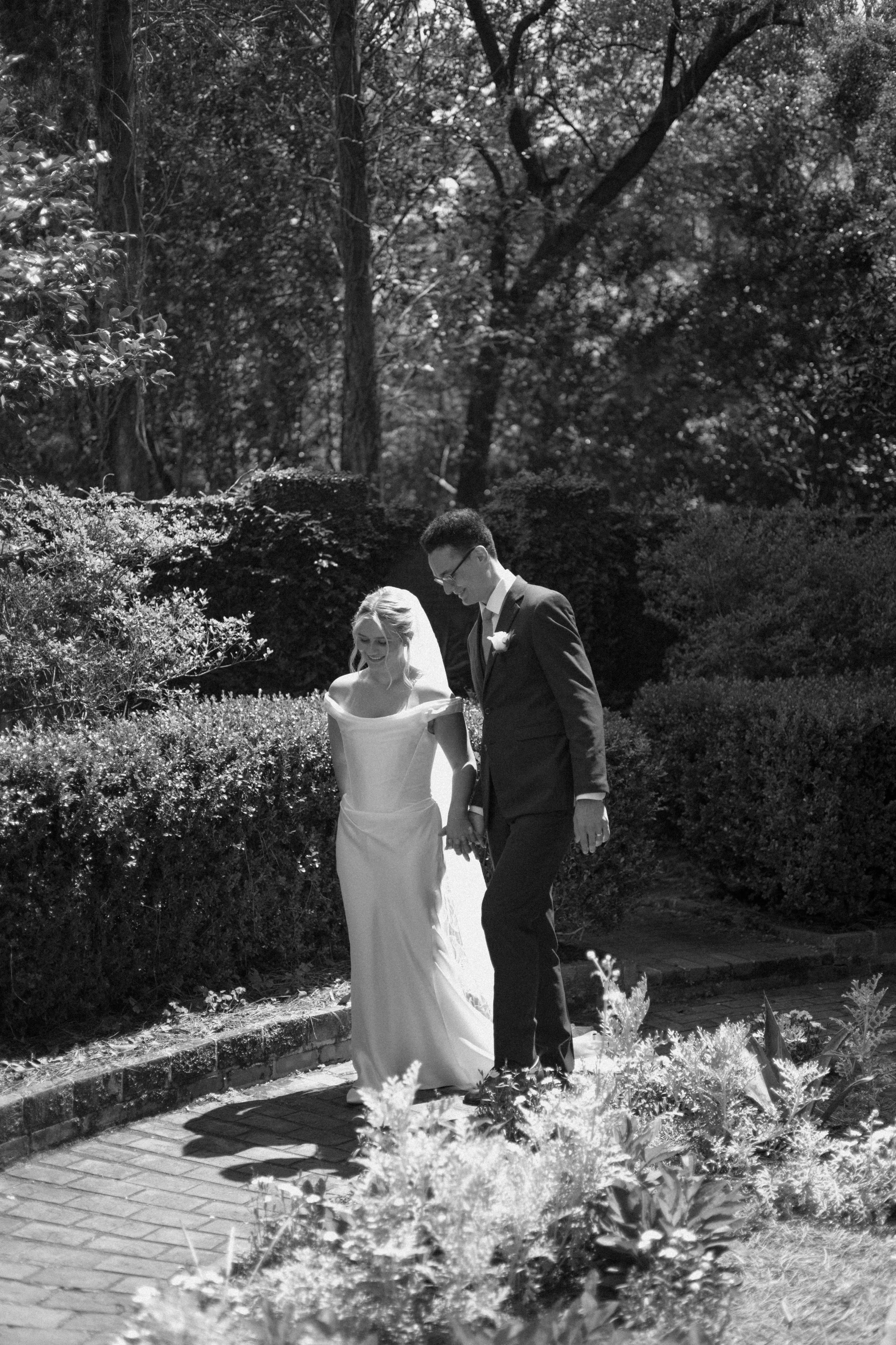 Bride and Groom walking around Maclay Gardens State Park