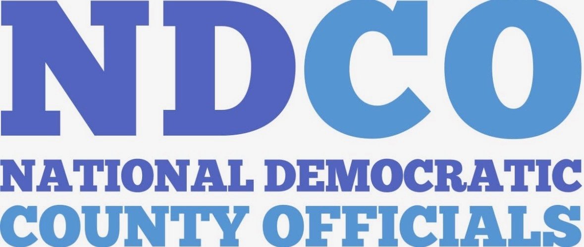 Text reading 'NDCO NATIONAL DEMOCRATIC COUNTY OFFICIALS' in various shades of blue.