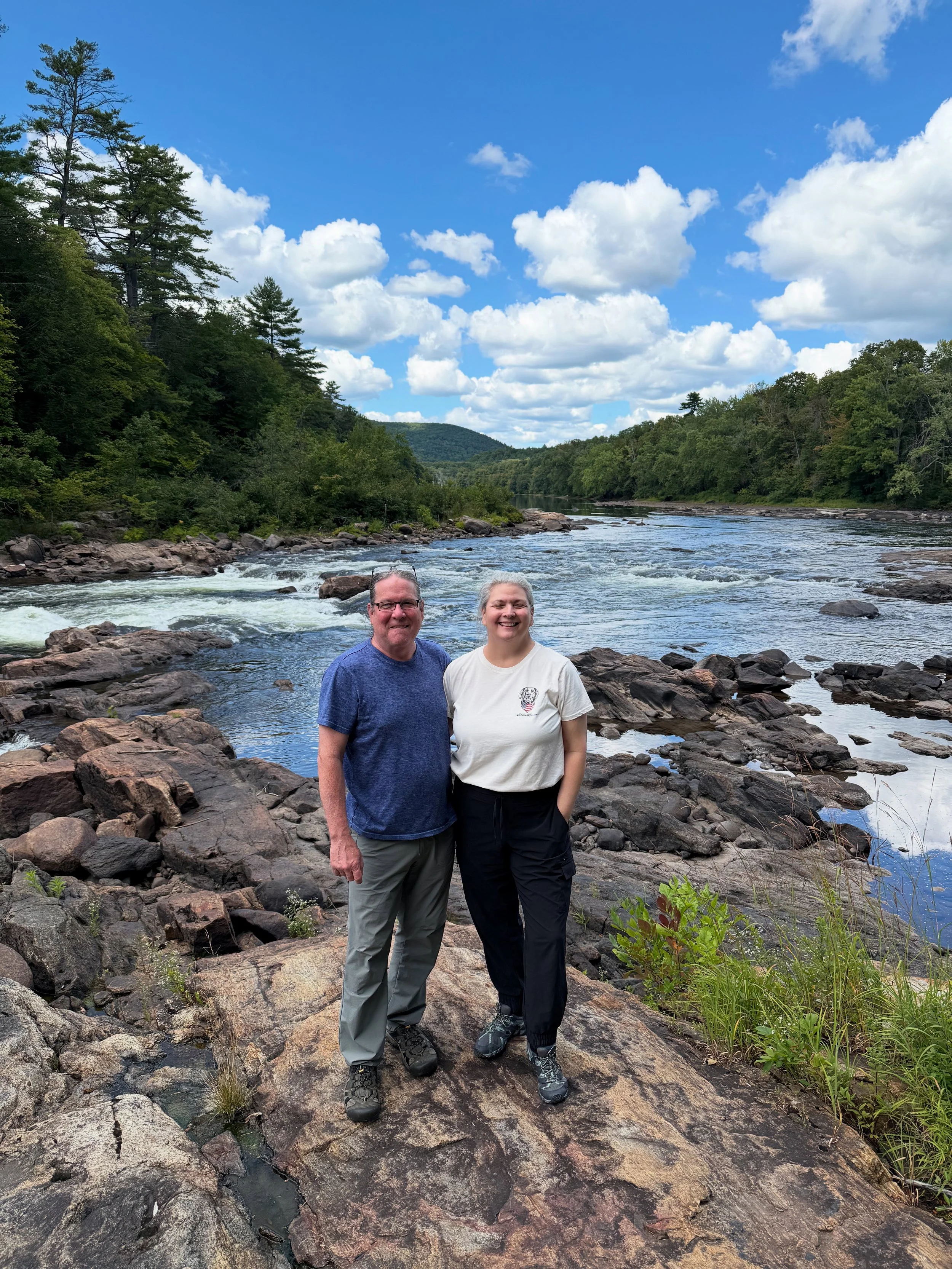 Mom n Pop standing at the confluence of the Sacandaga and Hudson Rivers, the narrowest point of the Hudson.