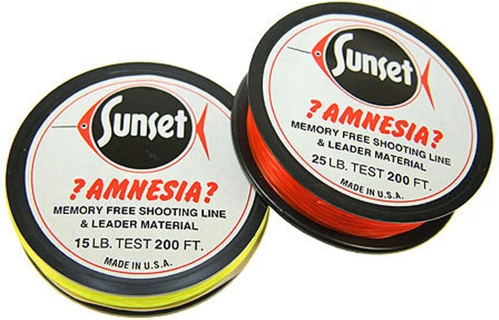 Two spools of Sunset brand shooting line, one yellow and one red, with labels mentioning memory free shooting line and leader material, test weight, and length.