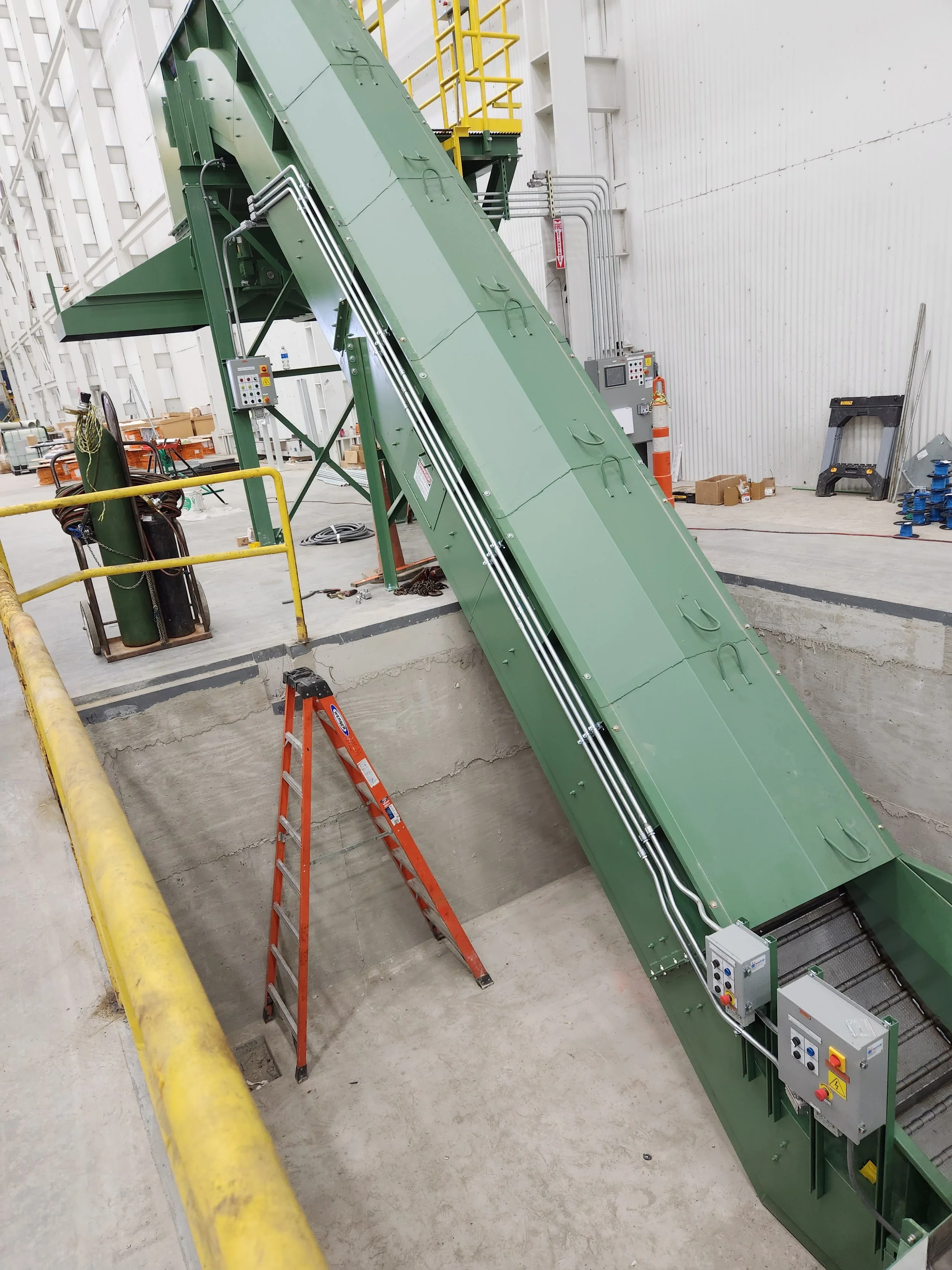 A green start to finish turn-key conveyor installation.