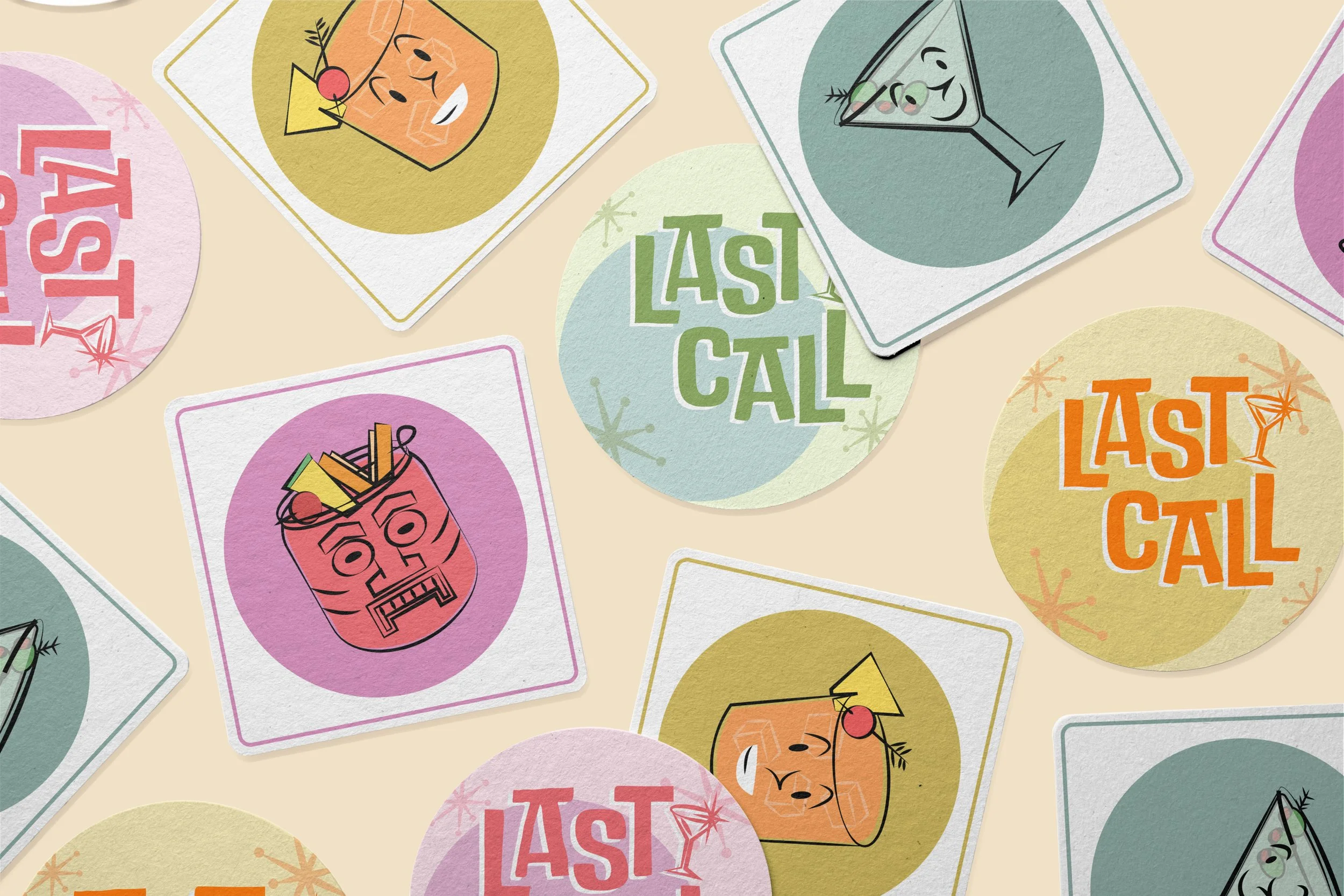 Assorted "Last Call" coasters with the logo and illustrations on them